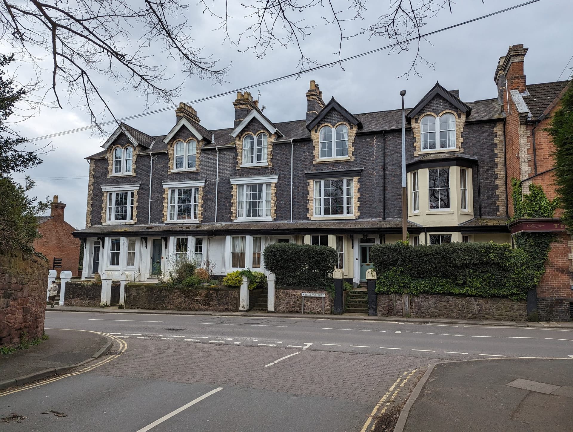Victorian brick terrace with gabled attic dormers, bay windows and slate roofs at 47 to 53 Belle Vue Road, Shrewsbury