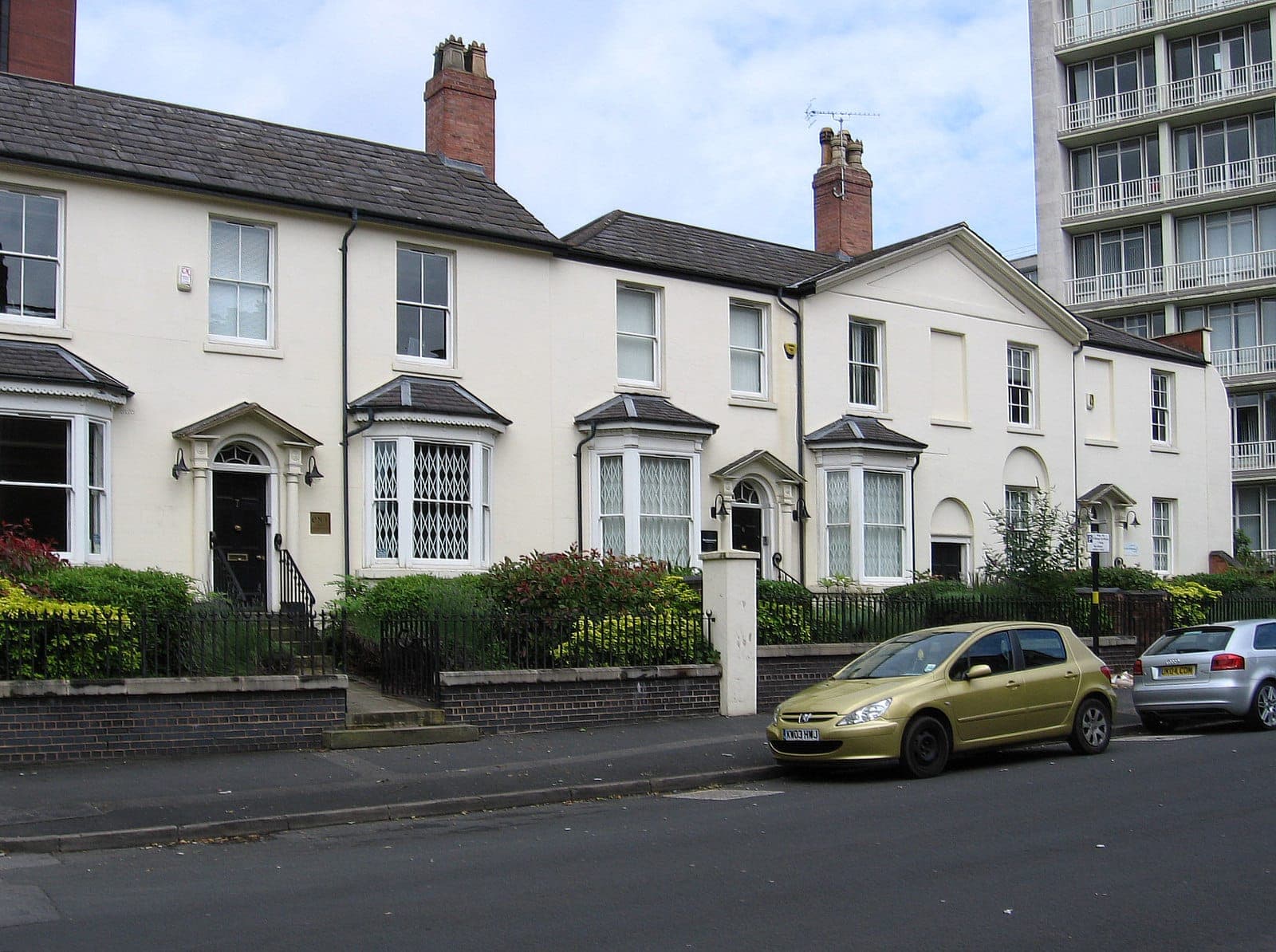 Stucco-fronted villas with slate roofs and tall chimneys on George Road, Edgbaston